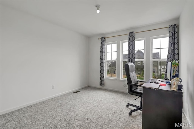 708 Kenmare Ct, Ofallon, MO 63368 - carpeted home office with healthy amount of natural light and baseboards