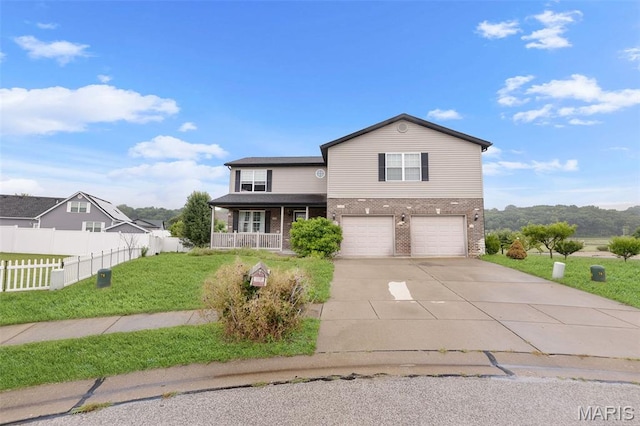 806 Erika Leigh Ct, Caseyville, IL 62232 - traditional home featuring brick siding, a garage, covered porch, and driveway