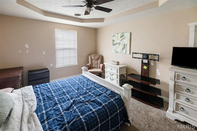 806 Erika Leigh Ct, Caseyville, IL 62232 - carpeted bedroom featuring a tray ceiling and ceiling fan
