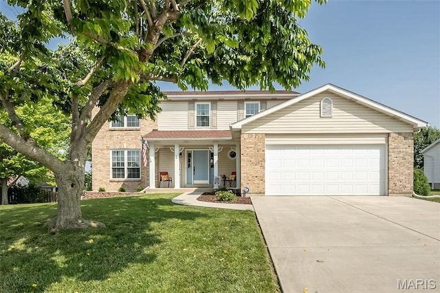 5 Poor Richard Ct, Ofallon, MO 63366 - traditional-style home with a garage, driveway, a front lawn, a porch, and brick siding