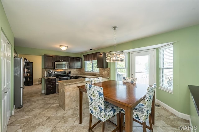 5 Poor Richard Ct, Ofallon, MO 63366 - dining room featuring baseboards