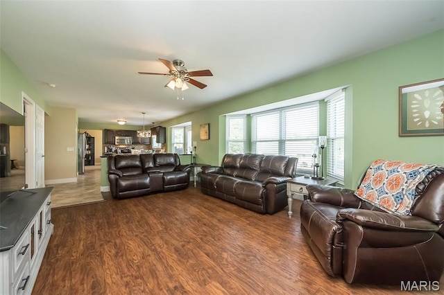 5 Poor Richard Ct, Ofallon, MO 63366 - living area with ceiling fan and dark wood finished floors