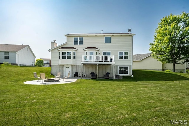 5 Poor Richard Ct, Ofallon, MO 63366 - back of property featuring an outdoor fire pit, a patio, a yard, a chimney, and a deck