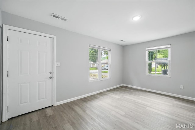 260 S Hartnett Ave, Saint Louis, MO 63135 - entrance foyer featuring plenty of natural light and wood finished floors