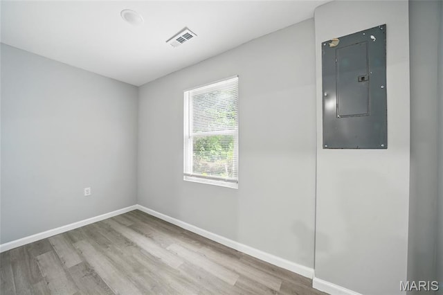 260 S Hartnett Ave, Saint Louis, MO 63135 - unfurnished room with electric panel and wood finished floors