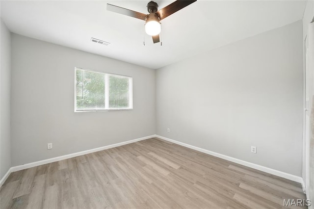 260 S Hartnett Ave, Saint Louis, MO 63135 - spare room with light wood-style flooring and ceiling fan