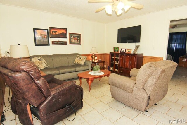 17748 State Highway C, Advance, MO 63730 - living room with a ceiling fan, wainscoting, and light tile patterned floors
