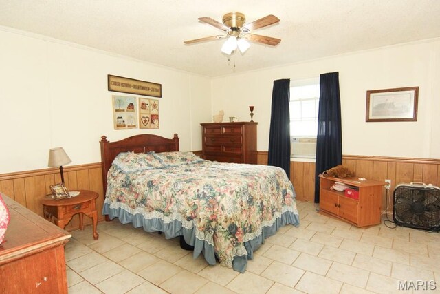 17748 State Highway C, Advance, MO 63730 - tiled bedroom with a wainscoted wall, wood walls, ceiling fan, and ornamental molding