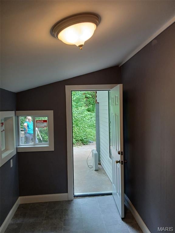 111 N Levering Ave, Hannibal, MO 63401 - doorway with lofted ceiling and baseboards