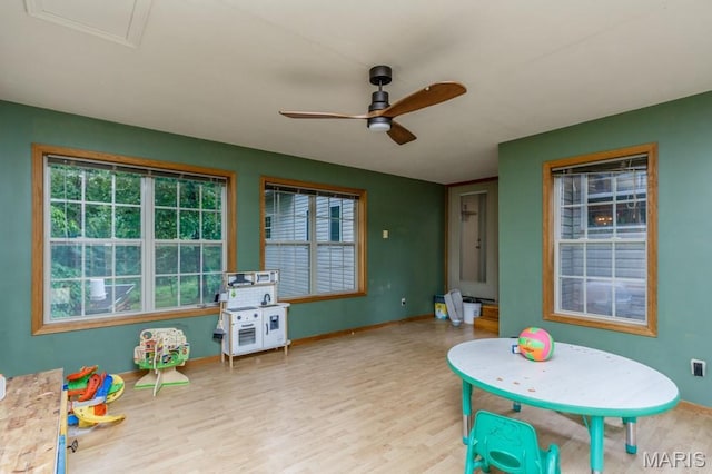 25350 Englewood Ln, Lebanon, MO 65536 - game room featuring a ceiling fan, wood finished floors, and baseboards