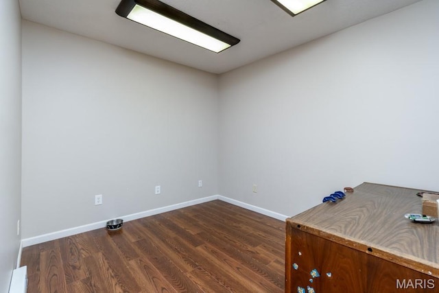 25350 Englewood Ln, Lebanon, MO 65536 - unfurnished office featuring dark wood-style flooring and baseboards