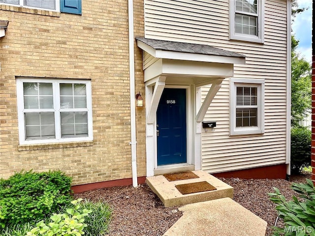 9158 Eager Rd, Brentwood, MO 63144 - entrance to property with brick siding
