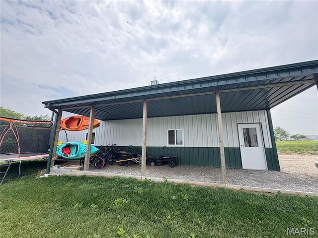 3581 Eagle Crest Dr, Palmyra, MO 63461 - view of outdoor structure featuring a trampoline and a carport