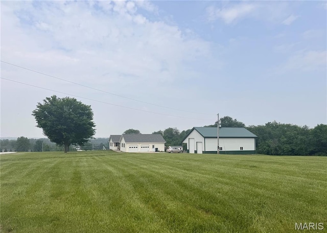 3581 Eagle Crest Dr, Palmyra, MO 63461 - view of green lawn featuring an outbuilding and a view of rural / pastoral area