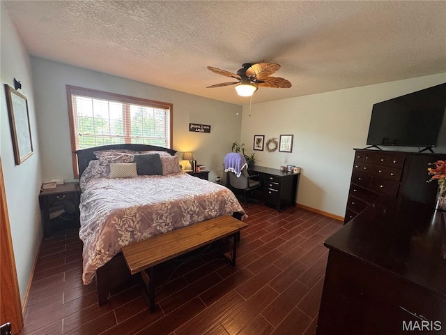 3581 Eagle Crest Dr, Palmyra, MO 63461 - bedroom featuring dark wood-style floors, a textured ceiling, a ceiling fan, and baseboards