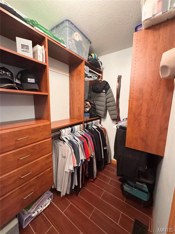 3581 Eagle Crest Dr, Palmyra, MO 63461 - walk in closet with wood finish floors