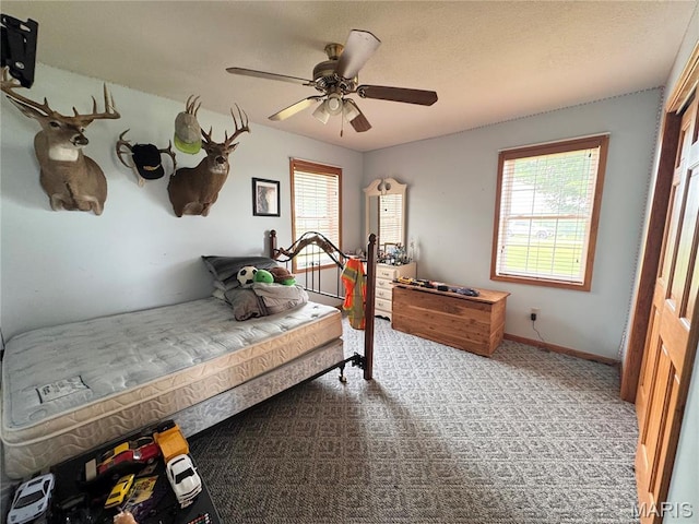 3581 Eagle Crest Dr, Palmyra, MO 63461 - bedroom with carpet flooring, baseboards, and ceiling fan