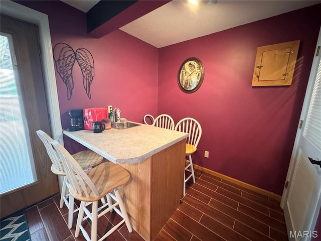 3581 Eagle Crest Dr, Palmyra, MO 63461 - dining area featuring dark wood-style flooring and baseboards