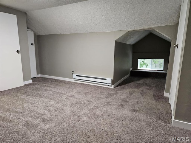 308 E Kathleen, Sikeston, MO 63801 - bonus room featuring a baseboard radiator, vaulted ceiling, a textured ceiling, carpet, and baseboards