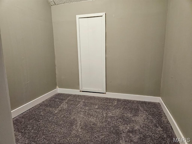308 E Kathleen, Sikeston, MO 63801 - empty room featuring dark carpet and baseboards
