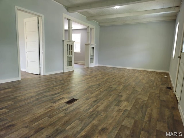 308 E Kathleen, Sikeston, MO 63801 - empty room featuring dark wood-style flooring, beam ceiling, and baseboards