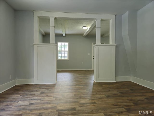 308 E Kathleen, Sikeston, MO 63801 - empty room featuring beamed ceiling, baseboards, and dark wood-style floors