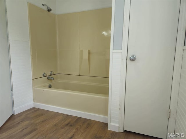 308 E Kathleen, Sikeston, MO 63801 - bathroom featuring bathing tub / shower combination and wood finished floors