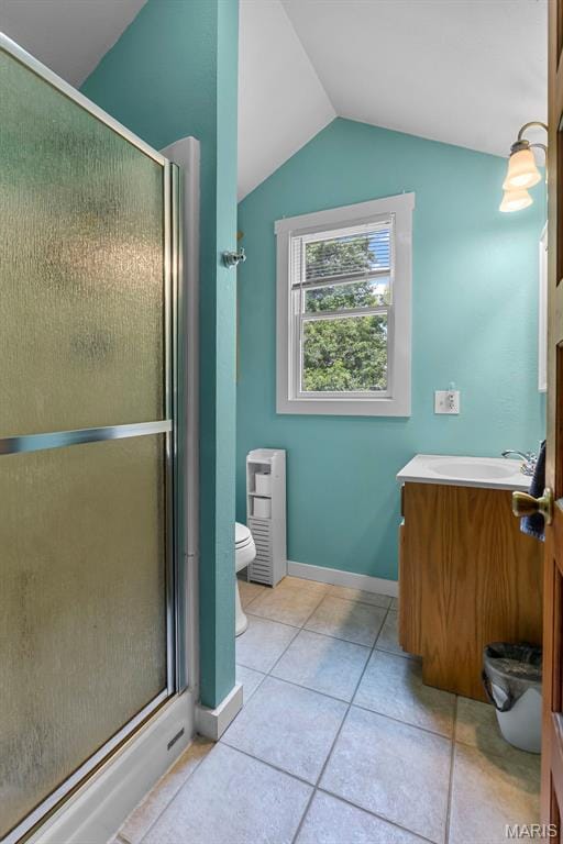618 Parkview St, Jackson, MO 63755 - full bath with toilet, vanity, a stall shower, tile patterned floors, and lofted ceiling