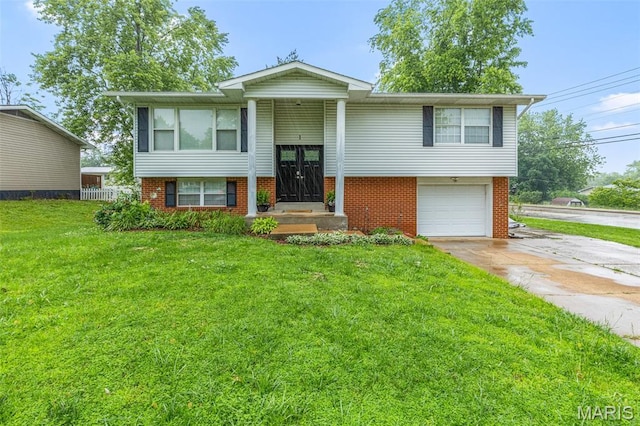 1 Mileva Ct, Farmington, MO 63640 - raised ranch with concrete driveway, brick siding, a front lawn, and a garage