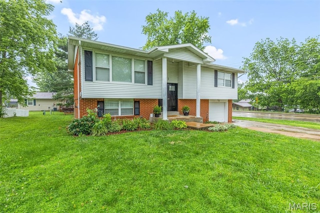 1 Mileva Ct, Farmington, MO 63640 - raised ranch featuring driveway, a front lawn, brick siding, and an attached garage