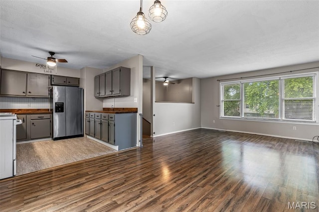 1 Mileva Ct, Farmington, MO 63640 - kitchen featuring stainless steel fridge, ceiling fan, wood counters, and wood finished floors