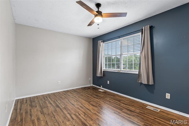 1 Mileva Ct, Farmington, MO 63640 - spare room with wood finished floors, ceiling fan, a textured ceiling, and baseboards