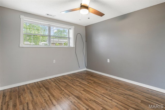 1 Mileva Ct, Farmington, MO 63640 - unfurnished room with wood finished floors, a ceiling fan, and baseboards