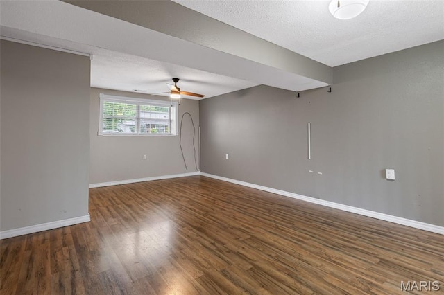 1 Mileva Ct, Farmington, MO 63640 - unfurnished room with ceiling fan, wood finished floors, baseboards, and a textured ceiling