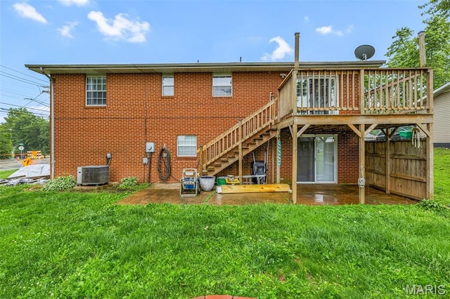1 Mileva Ct, Farmington, MO 63640 - rear view of property featuring a deck, a lawn, brick siding, and stairs