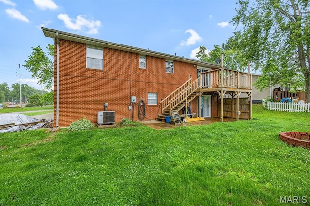 1 Mileva Ct, Farmington, MO 63640 - back of property featuring stairway, a deck, brick siding, and central AC unit