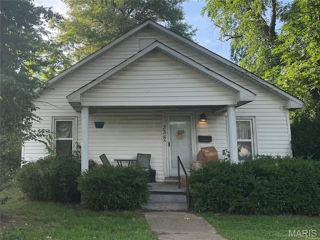 338 E Gladys St, Sikeston, MO 63801 - view of front of home with covered porch
