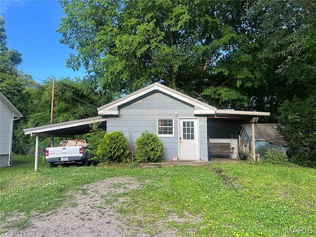1419 N Spanish St, Cape Girardeau, MO 63701 - view of property exterior with a lawn
