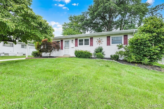 1385 Mallard Ln, Florissant, MO 63031 - ranch-style house with a front lawn and an attached garage