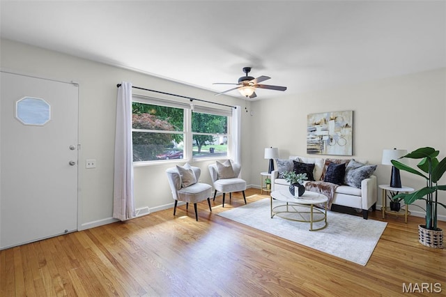 1385 Mallard Ln, Florissant, MO 63031 - living area with a ceiling fan and wood finished floors