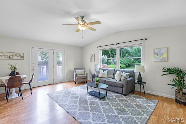 1385 Mallard Ln, Florissant, MO 63031 - living area with plenty of natural light, ceiling fan, lofted ceiling, and wood finished floors