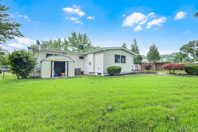 1385 Mallard Ln, Florissant, MO 63031 - rear view of house with a storage unit