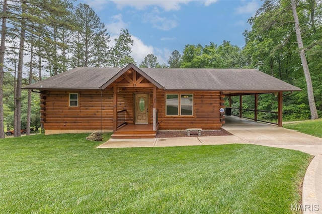 13 Sugar Rock Rd, Van Buren, MO 63965 - cabin with log exterior, driveway, an attached carport, and a front yard
