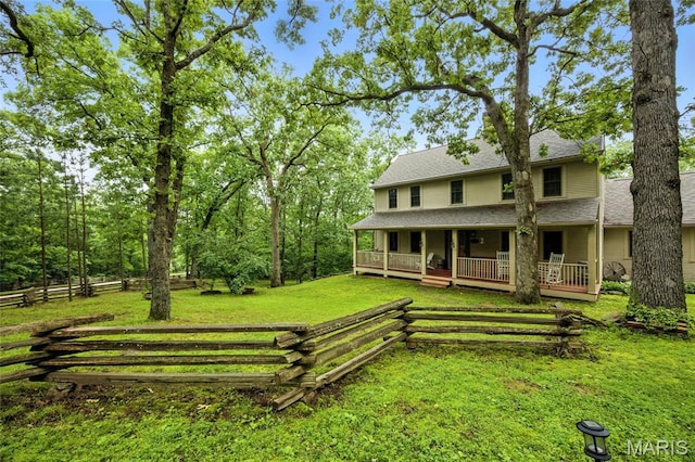 1423 Emily Ln, Festus, MO 63028 - rear view of property featuring roof with shingles and a porch