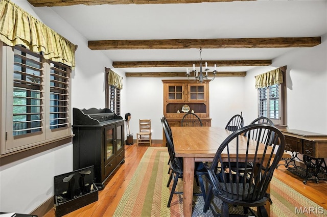 1423 Emily Ln, Festus, MO 63028 - dining area with light wood-style flooring and beamed ceiling