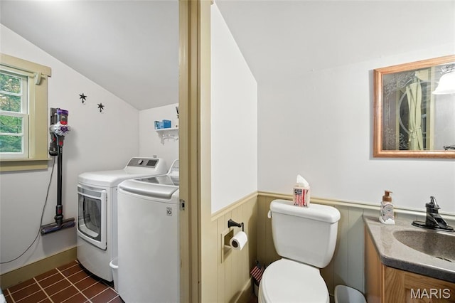 1423 Emily Ln, Festus, MO 63028 - laundry area with separate washer and dryer and a wainscoted wall