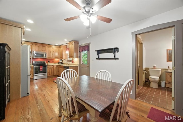 1423 Emily Ln, Festus, MO 63028 - dining area with light wood-style floors, a ceiling fan, and recessed lighting