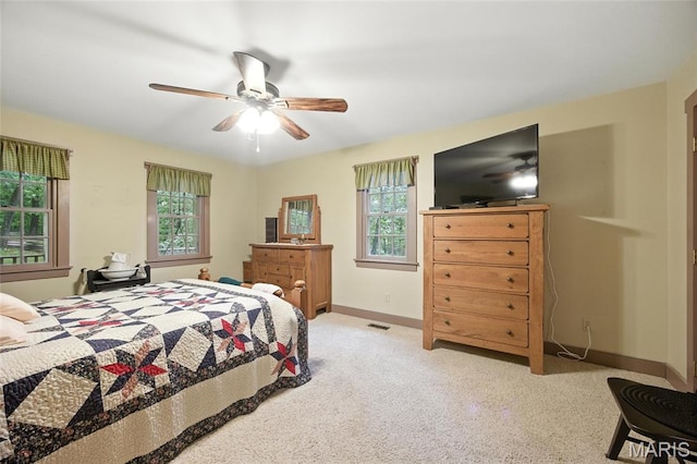 1423 Emily Ln, Festus, MO 63028 - bedroom featuring multiple windows, carpet flooring, and ceiling fan
