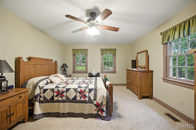 1423 Emily Ln, Festus, MO 63028 - bedroom with light colored carpet and a ceiling fan