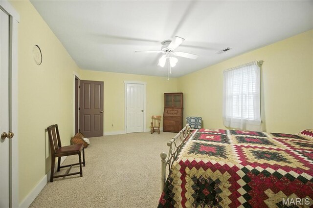 1423 Emily Ln, Festus, MO 63028 - carpeted bedroom with baseboards and ceiling fan